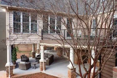 Sunroom-Addition-with-Deck-on-Right-Side