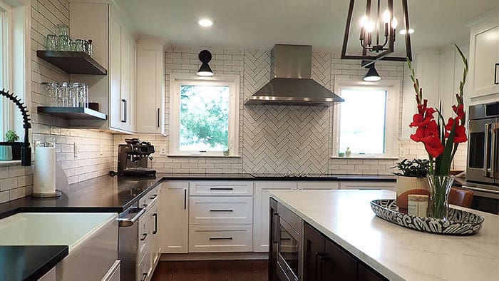 Forest Kitchen Remodel with multi color countertops 