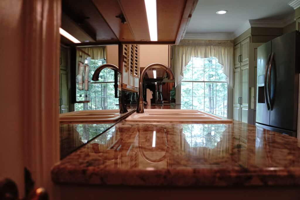 Granite Countertops and Mirrored Backsplash for Appomattox Kitchen Remodel