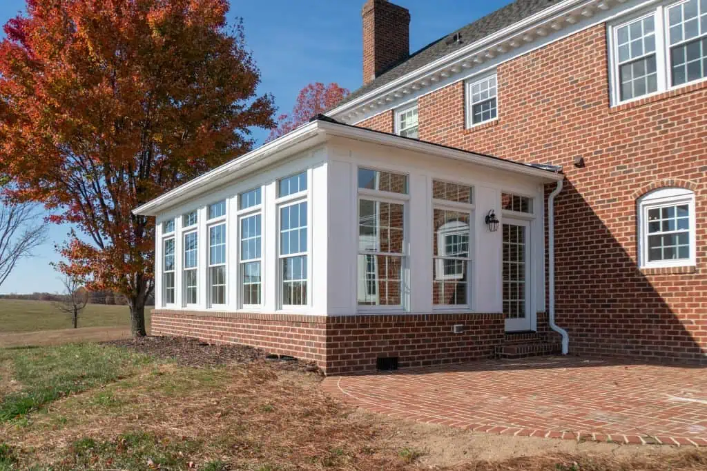 home addition for sunroom with new siding