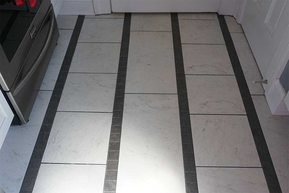 Tile flooring that is both updated, yet maintains a vintage feel suiting the age of this home